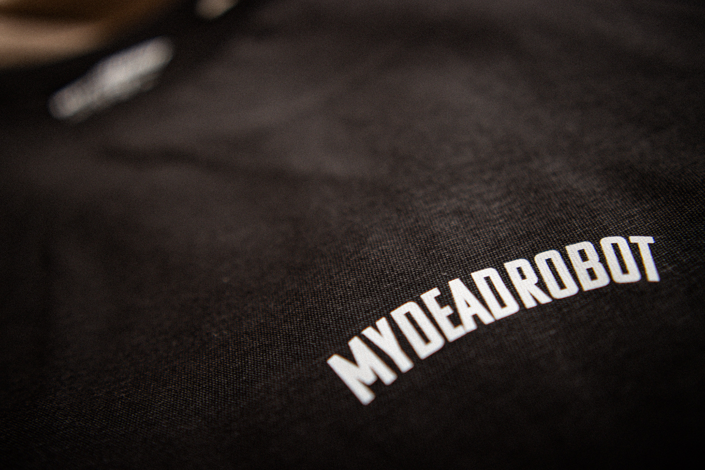 Black shirt with 'MYDEADROBOT' logo on a dark background