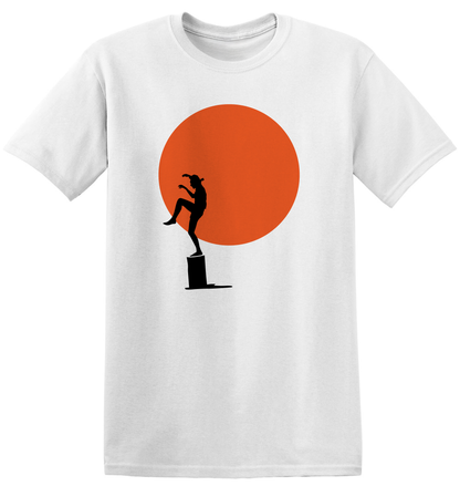 White Karate Kid themed t-shirt with a black silhouette of a person and an orange 'sun' circle on a white background